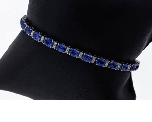 tanzanite, tanzanite maquise, marquise cocktail ring, marquise ring, tanzanite ring, tanzanite and diamonds, oval tanzanite, oval gemstone, oval ring, pear tanzanite, pear tanzanite ring, tanzanite ring, baguette and tanzanite, tanzanite bracelet